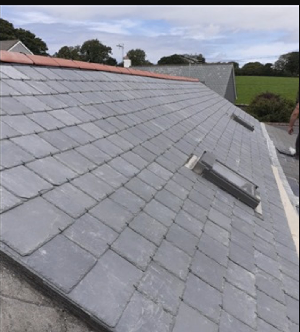 Grey tiled roof work by NAC Roofing