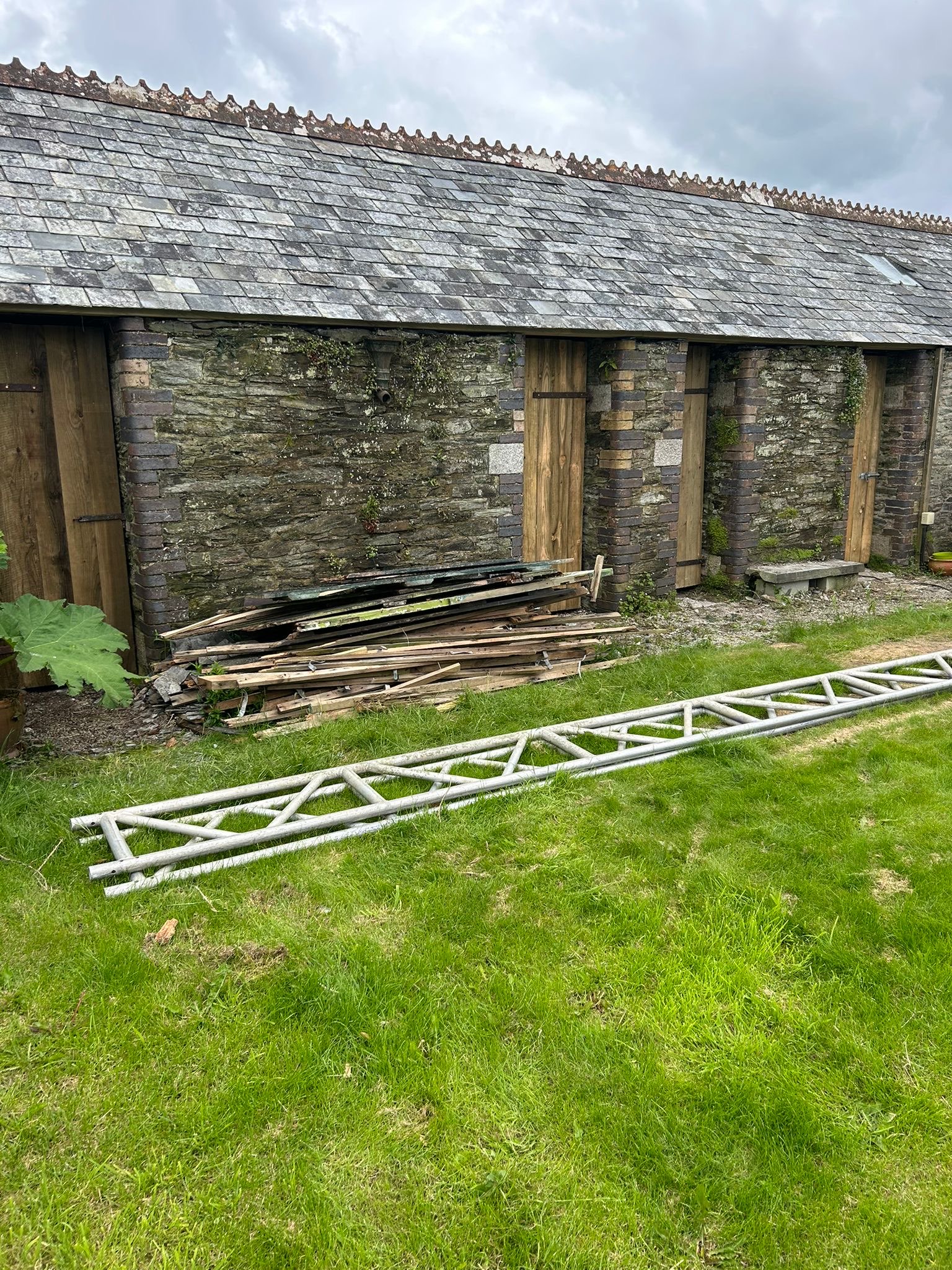 Stone building roof before NAC Roofing work
